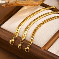 Women's Flat Cuban Bracelet — 6mm Gold-Plated Macramé-Edge Steel