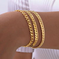 Women's Flat Cuban Bracelet — 6mm Gold-Plated Macramé-Edge Steel