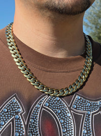 Real photo - gold Cuban link chain on model, daylight