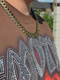 Real photo - gold Cuban chain close up on neck