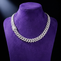 Moissanite Cuban link chain 12mm D-VVS1 rhodium-plated 925 sterling silver on royal purple velvet