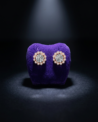 Moissanite stud earrings on royal purple velvet — Showtime Gems
