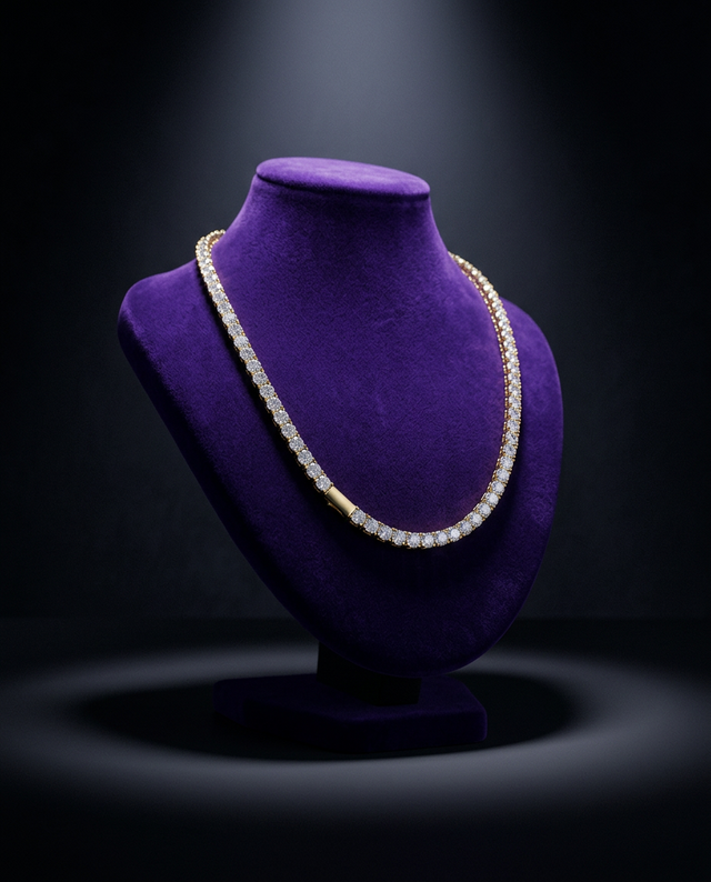 Iced-out CZ tennis chain on royal purple velvet bust — Showtime Gems