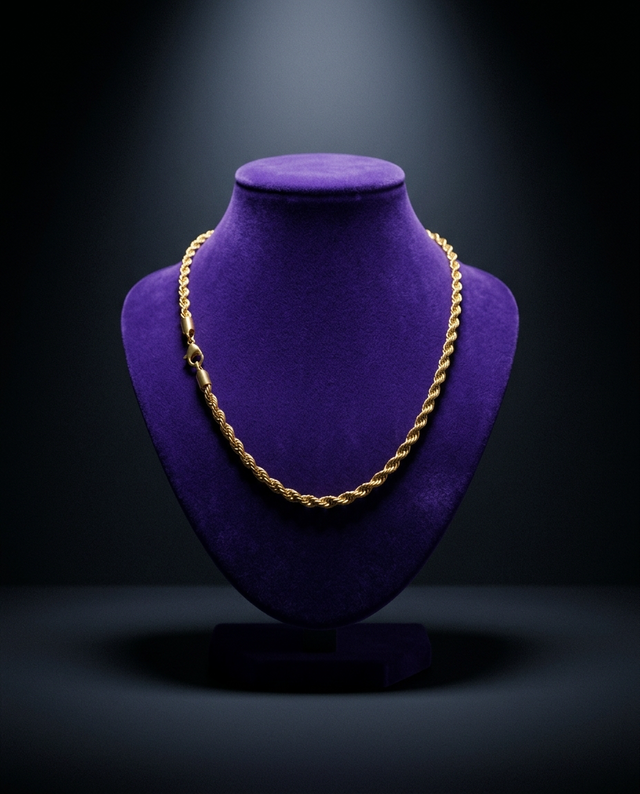Gold rope chain necklace on royal purple velvet bust — Showtime Gems