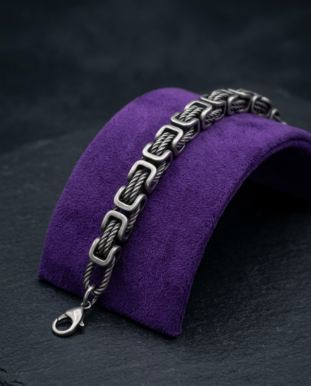 Byzantine chain bracelet on royal purple velvet ramp — Showtime Gems