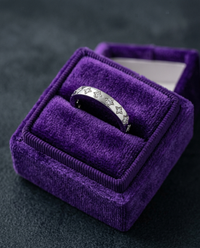 Moissanite wedding ring in royal purple velvet box — Showtime Gems