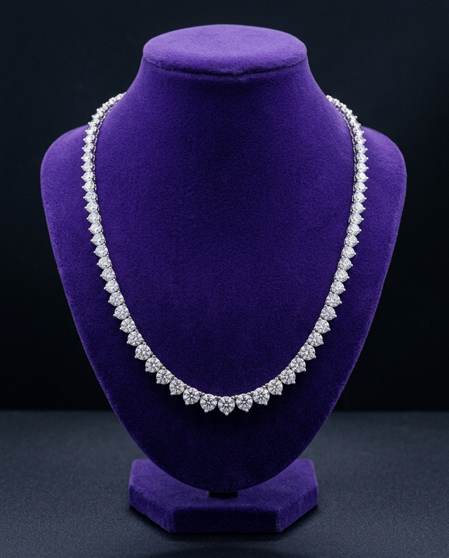 3-claw graduated moissanite tennis necklace on royal purple velvet bust — Showtime Gems
