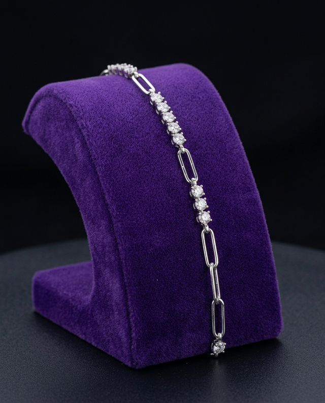 3mm round moissanite bracelet on royal purple velvet ramp — Showtime Gems