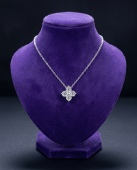 Dainty 0.4ct moissanite pendant necklace on royal purple velvet bust — Showtime Gems