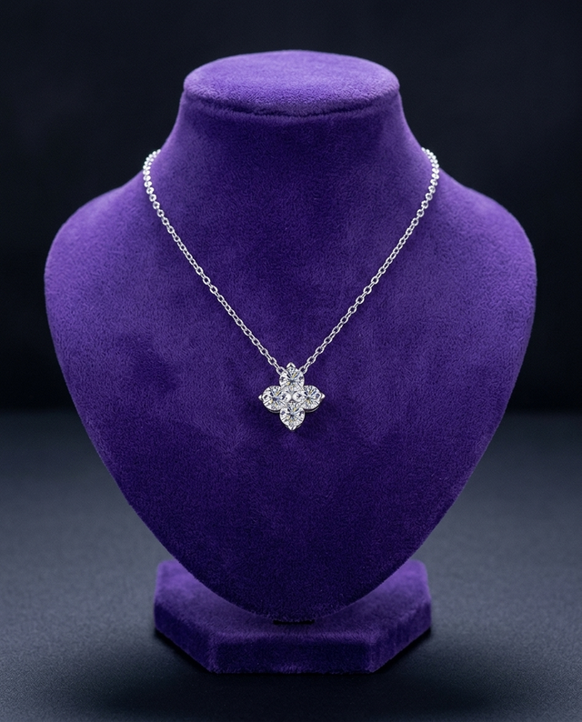 Dainty 0.4ct moissanite pendant necklace on royal purple velvet bust — Showtime Gems
