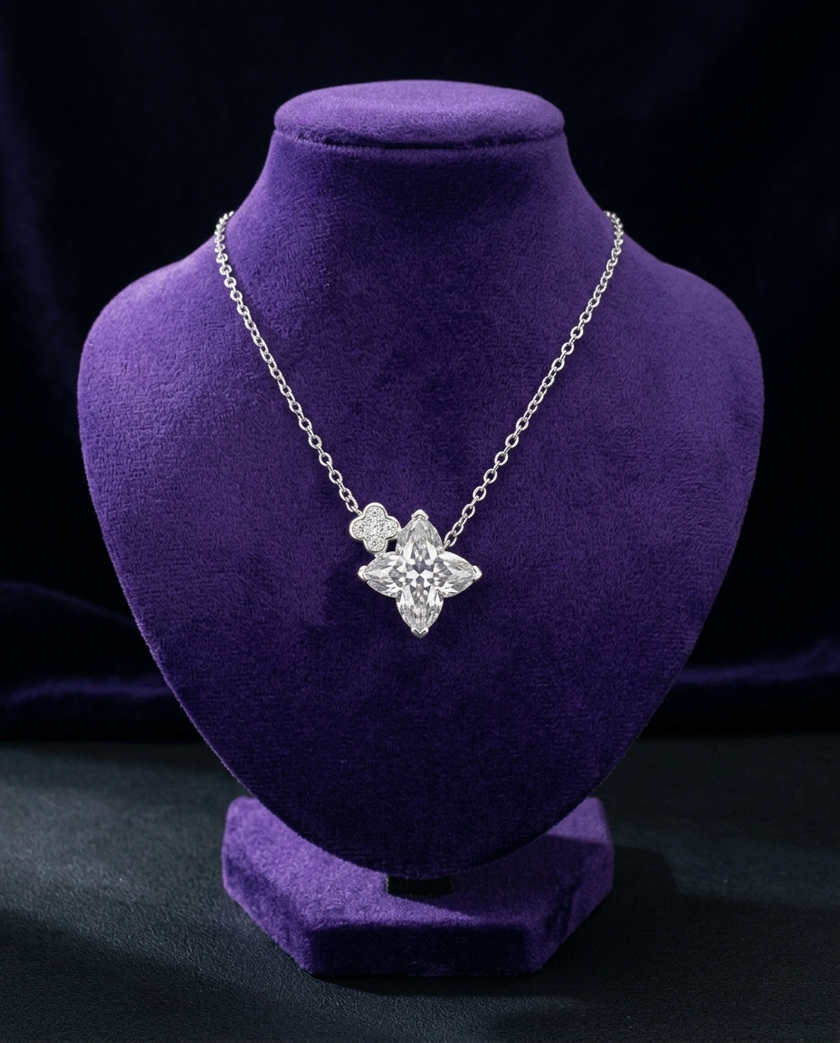 ATTAGEMS clover-cut moissanite necklace on royal purple velvet bust — Showtime Gems