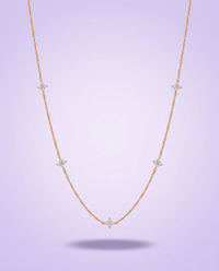 Rose gold clover-station moissanite necklace — lavender gradient