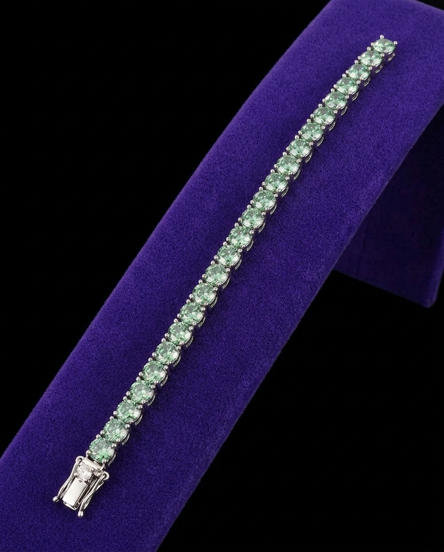 Green Moissanite Tennis Bracelet bracelet on royal purple velvet — Showtime Gems