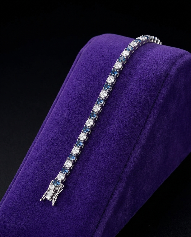 Blue Moissanite Tennis Bracelet bracelet on royal purple velvet — Showtime Gems