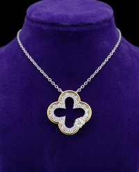 Two-Tone Clover Moissanite Necklace necklace on royal purple velvet — Showtime Gems