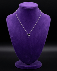 Moissanite Initial Letter Necklace necklace on royal purple velvet — Showtime Gems