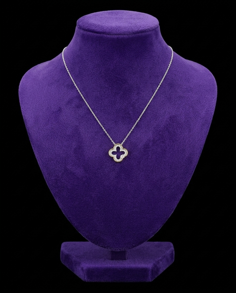 Two-Tone Clover Moissanite Necklace necklace on royal purple velvet — Showtime Gems