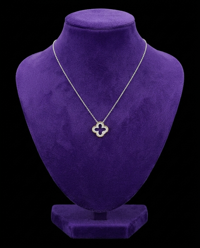 Two-Tone Clover Moissanite Necklace necklace on royal purple velvet — Showtime Gems