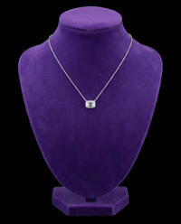 Emerald-Cut Moissanite Pendant Necklace necklace on royal purple velvet — Showtime Gems
