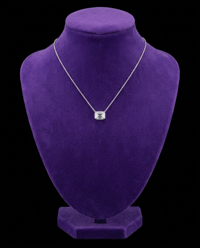 Emerald-Cut Moissanite Pendant Necklace necklace on royal purple velvet — Showtime Gems