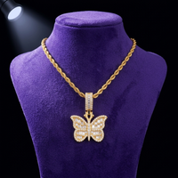 Moissanite Butterfly Pendant necklace in 18K gold on royal purple velvet — Showtime Gems