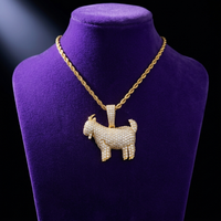 Moissanite Goat Pendant necklace in 18K gold on royal purple velvet — Showtime Gems