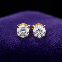 Moissanite Stud Earrings earrings in 18K gold on royal purple velvet — Showtime Gems