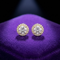 Moissanite Halo Stud Earrings earrings in 18K gold on royal purple velvet — Showtime Gems