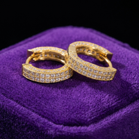 Moissanite Hoop Earrings earrings in 18K gold on royal purple velvet — Showtime Gems
