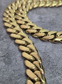 Real product photo - Cuban chain draped, link and finish detail
